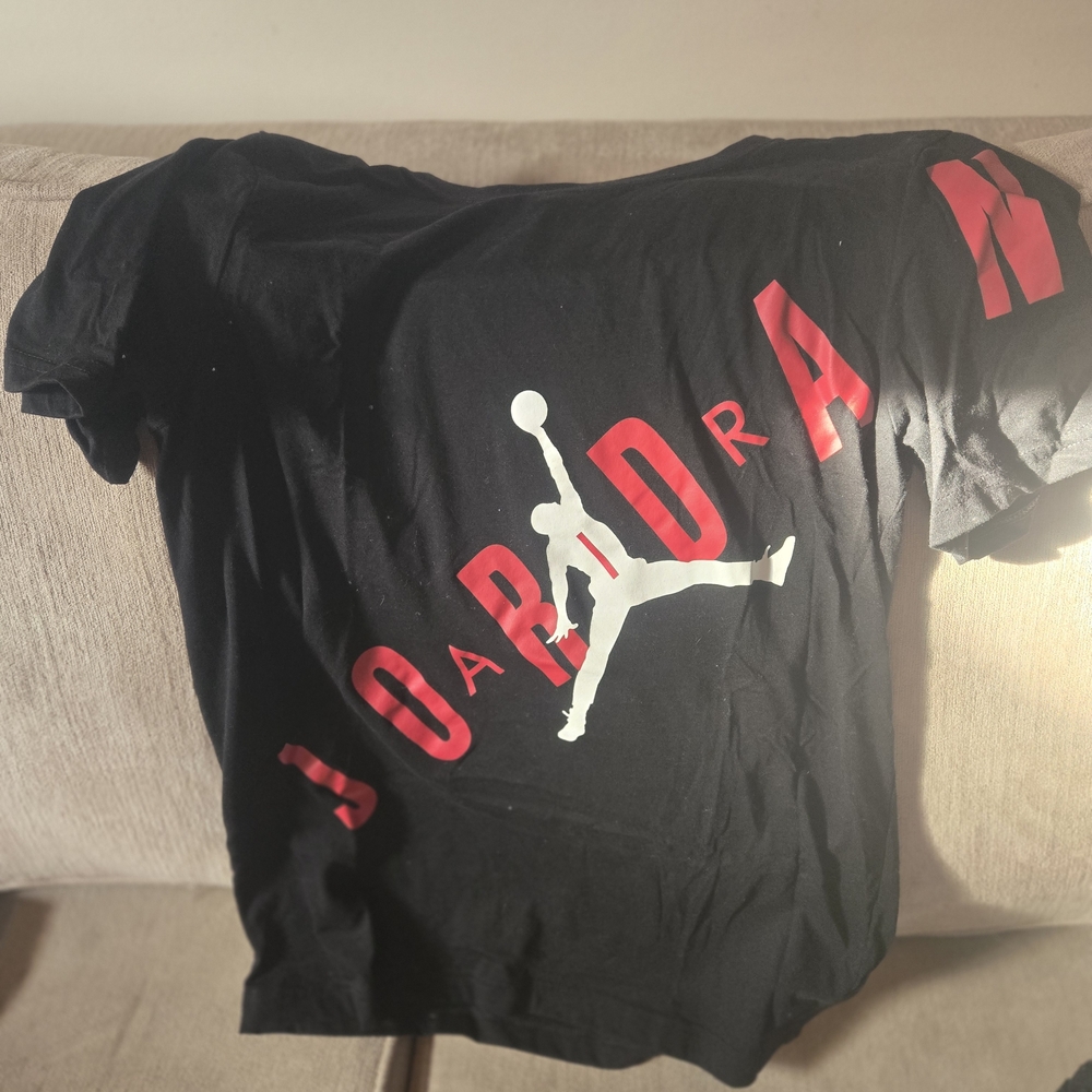 Jordan Black Tee with White Jumpman and Red Diagonal Text